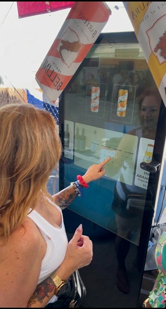 Festival guest interacting with the kiosk